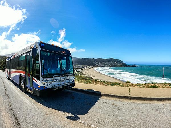 SamTrans bus driving a coastside route.