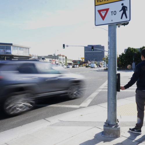 Person standing near crosswalk