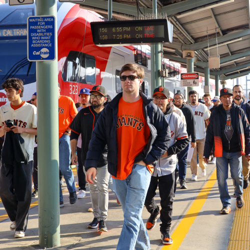 Fans disembarking Caltrain en route to Giants game